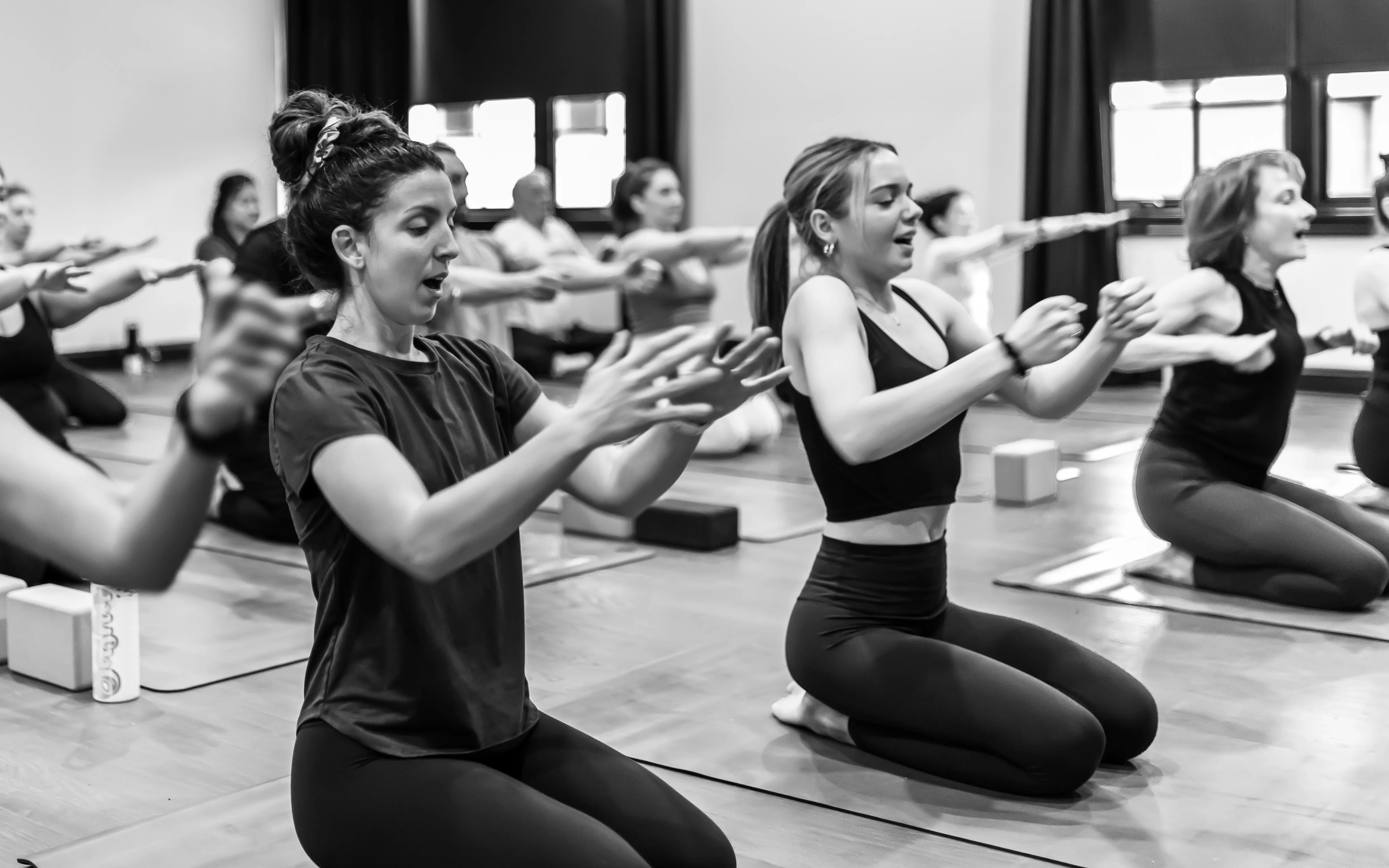 Women doing yoga in a studio